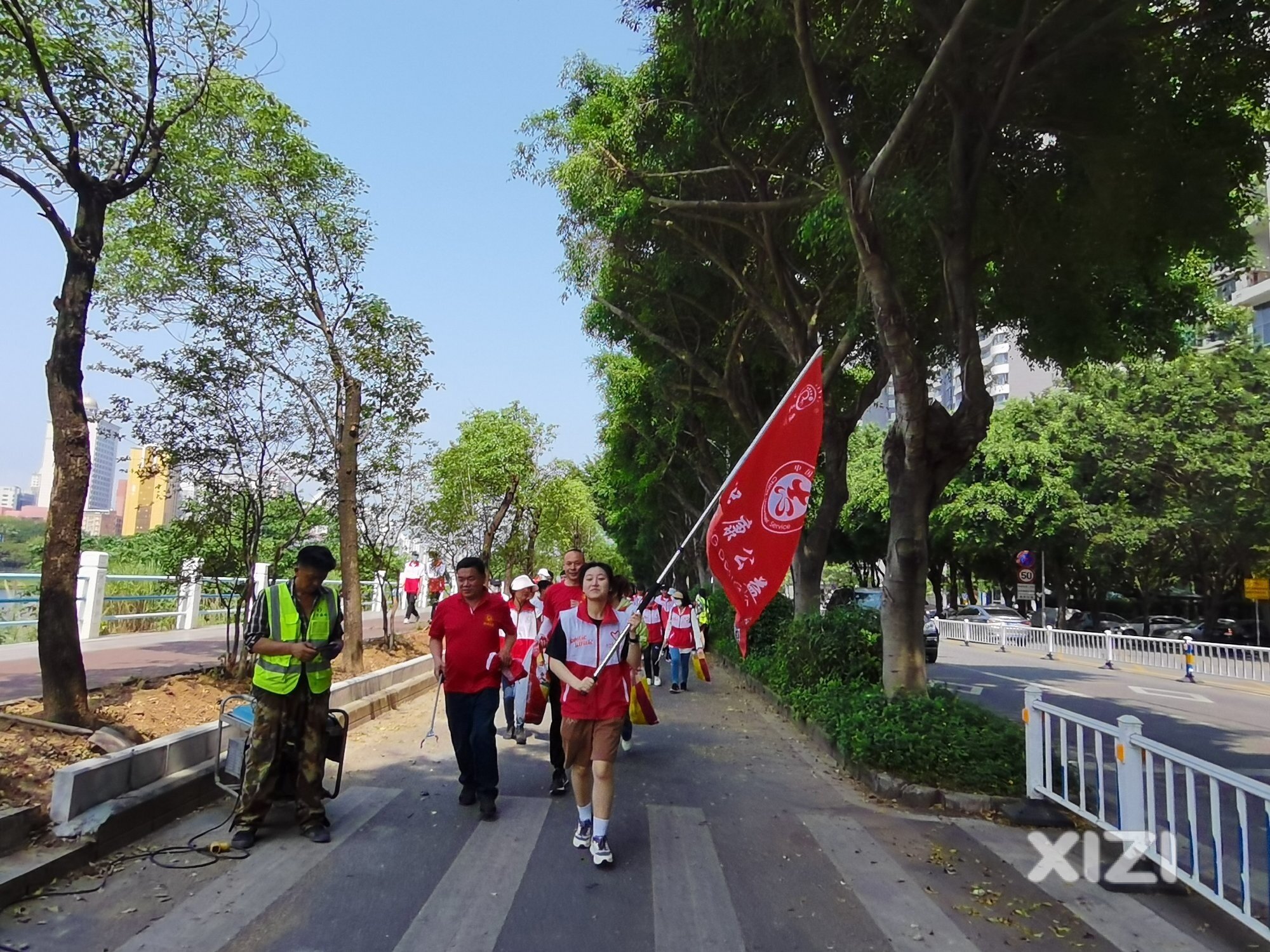 文明实践“你我弯弯腰·环境更美好”环保公益行